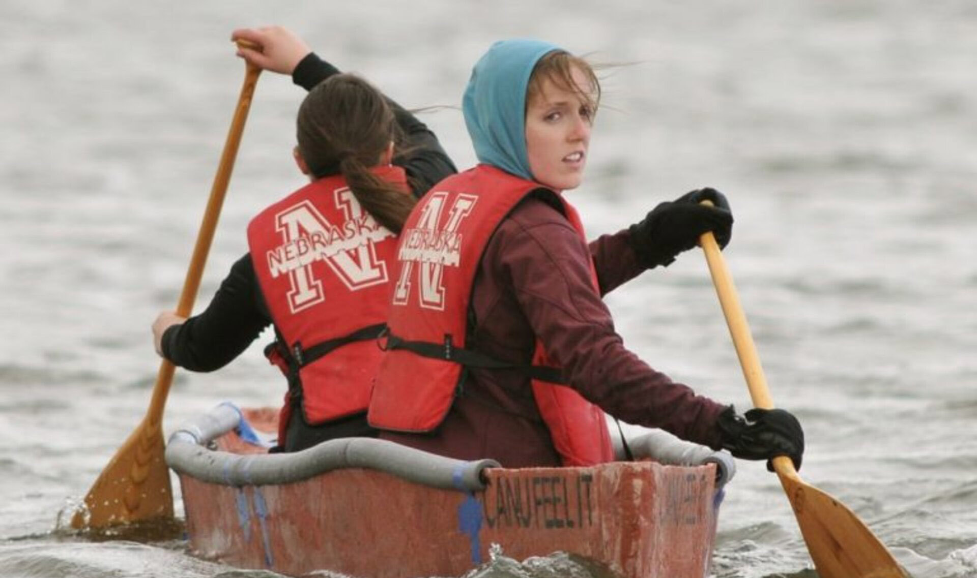 Students try out a concrete canoe