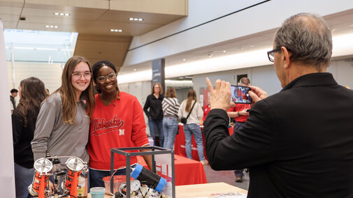 Two students are photographed at Engineering Visit Day.