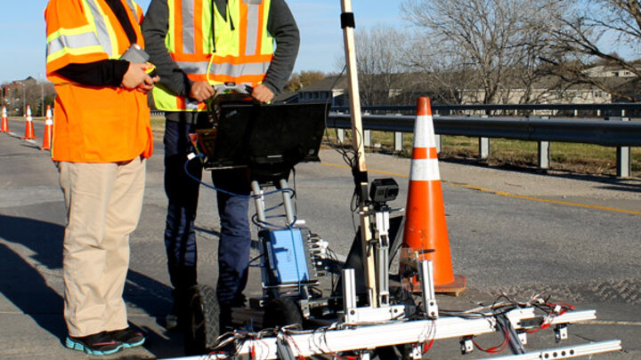 Jinying Zhu, assistant professor of civil engineering, and graduate student Hongbin Sun are using acoustics to detect defects in concrete bridge decks.