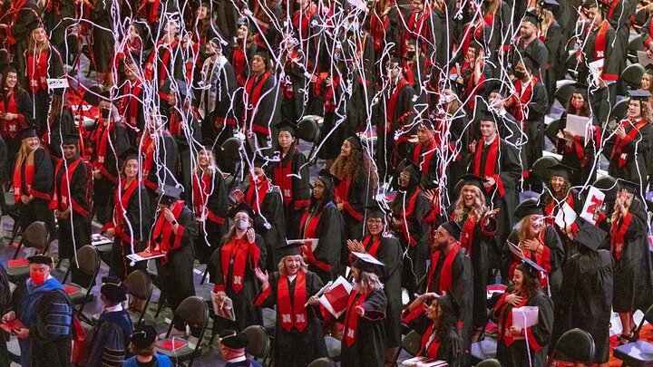 Streamers float down at the end of the undergraduate commencement ceremony Aug. 14 at Pinnacle Bank Arena.