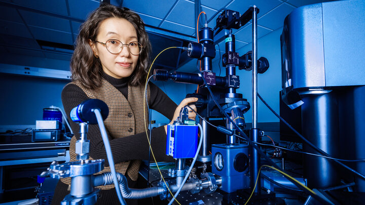 Yanan (Laura) Wang, assistant professor of electrical and computer engineering at the University of Nebraska–Lincoln, operates a laser interferometer inside her lab at the Engineering Research Center.