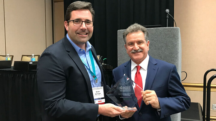 Dr. Sohrab Asgarpoor, associate dean for undergraduate programs, accepted the ASEE Excellence in Engineering for Veterans Award for the College of Engineering.