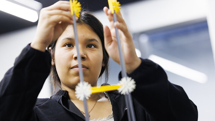 The Sovereign Native Youth STEM Leadership Academy provides opportunities for students in high schools to learn about STEM fields and get experience with laboratory work, such as using a shake table that emulates the effects of earthquakes on structures.