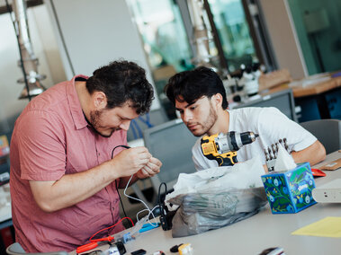 Two students working in the Design Hub