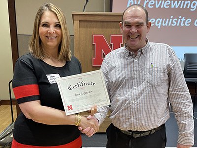 Jena Asgarpoor (left), professor of practice and director of the Master of Engineering Management program, was recognized as a CTT Teaching Ambassador. 
