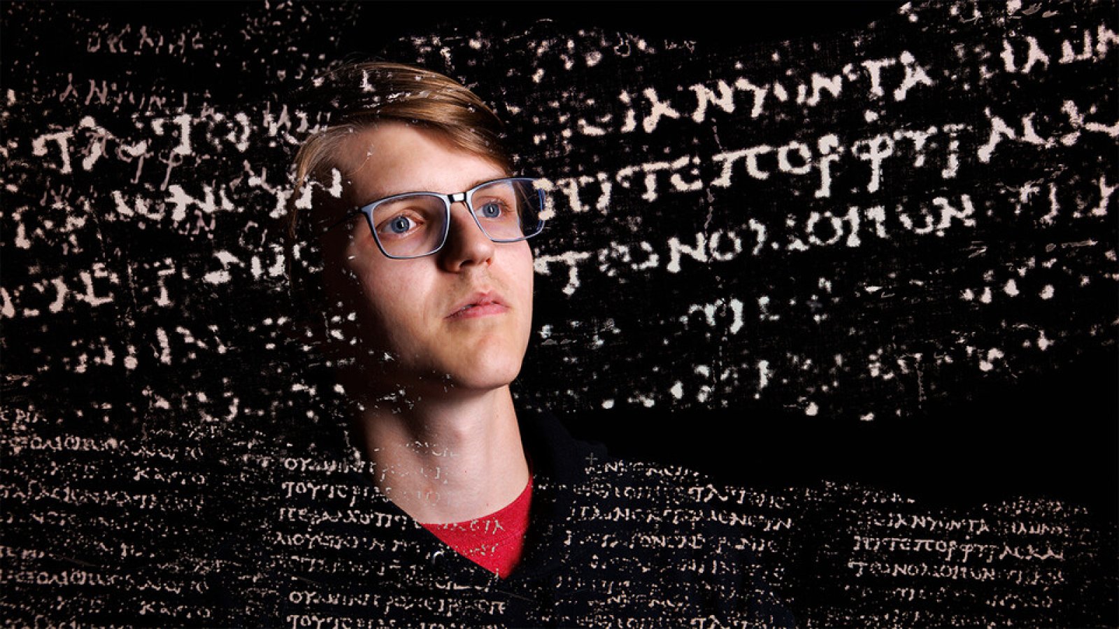Luke Farritor, a senior majoring in computer science in the Raikes School, is shown with superimposed Greek text from a nearly 2,000-year-old scroll that his work helping to decipher. (Craig Chandler / University Communication and Marketing)