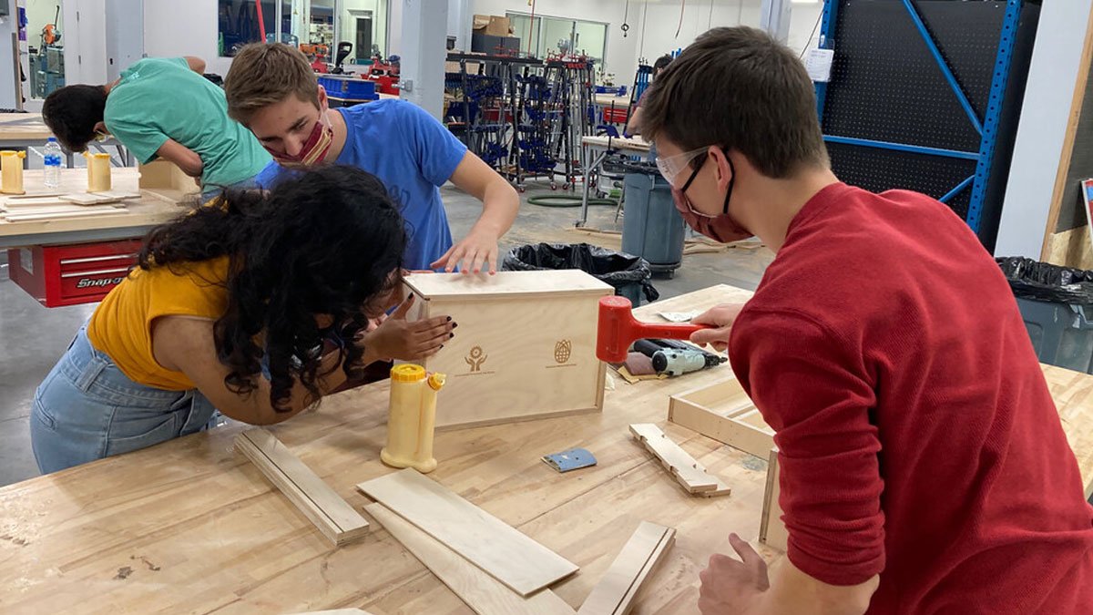 Students assemble toolboxes in Nebraska Innovation Studio on Oct. 17. The boxes will be given to the Whiteclay Makerspace.