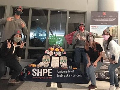 Society of Hispanic Professional Engineers chapter set up an Altar de Muertos outside the Dean's Office in Othmer Hall to celebrate Día de los Muertos (translated as Day of the Dead).